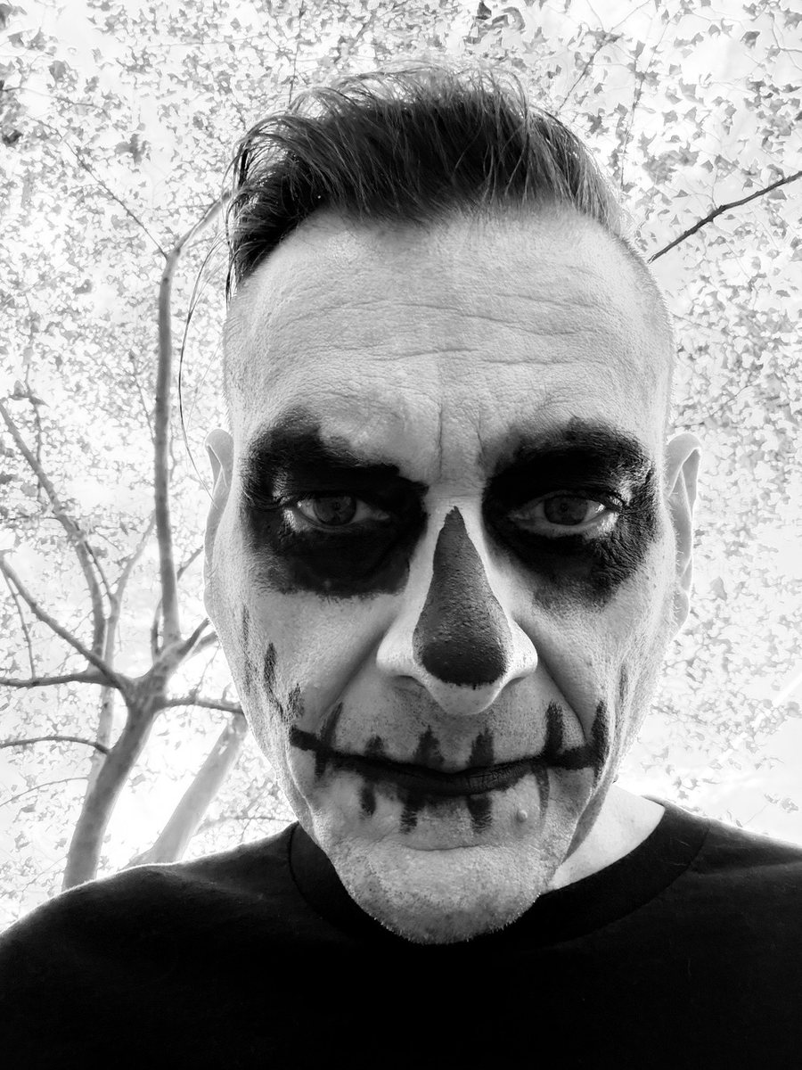 DJ Eritch in skull face paint, black and white